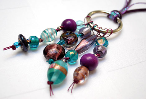 Jane aubergine/turquoise long cluster pendant - Stylish bead cluster pendant and sterling silver hoop hanging from a cord of green silk and blue iridescent ribbon. Length is adjustable by sliding knots.
