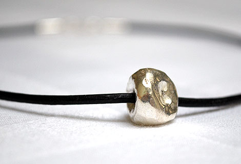 Kate silver ball pendant - Light and simnple sterling silver hammered ball on leather cord. Sterling silver ‘S’ hoop clasp.