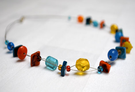 Jellybean wire threaded necklace - Pretty cluster of coloured beads, woven together with thin silver wire. Strung onto a single wire. Magnetic clasp.