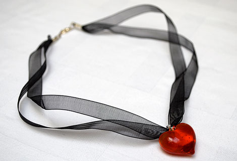 Sweetheart red pendant - A clear glass heart strung onto organza ribbon. Fastened with a lobster clasp